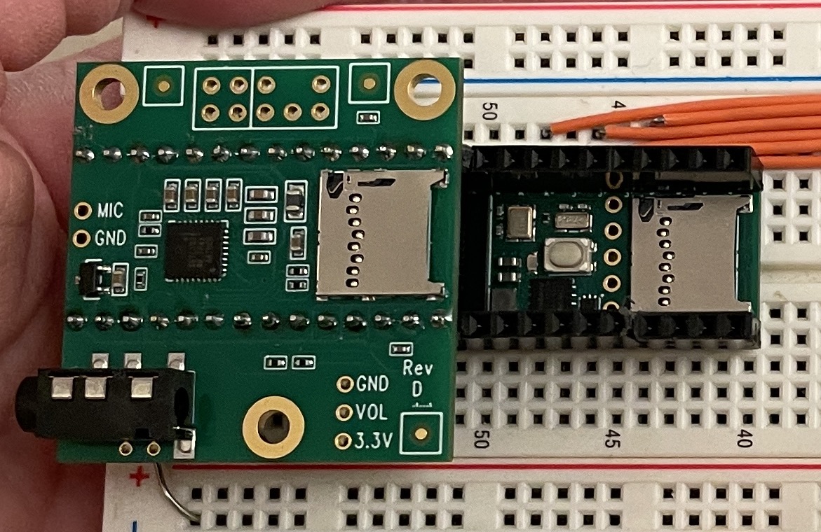 The Teensy 4.x audio shield stacked on top of a Teensy 4.1 which is inserted into a breadboard